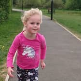 Five-year-old Anna Williams strides out on her 5km run