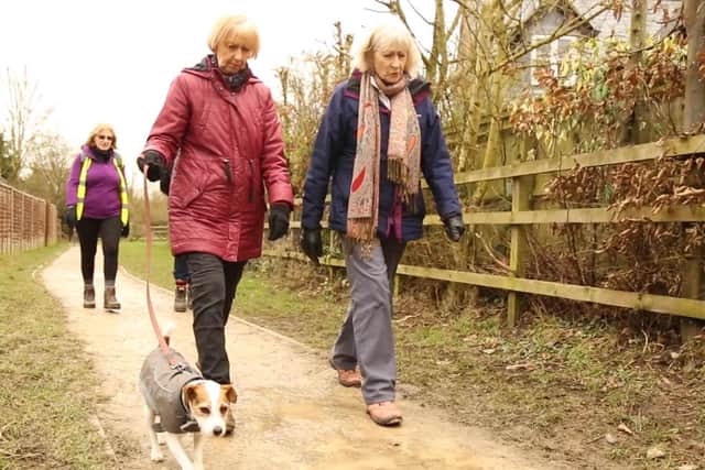 People walk their dog in Cherwell District
