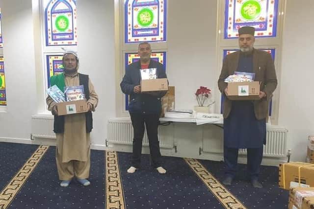 Volunteers from the Banbury Mosque, including its chairman (far right) Abu Hassan Hanif.