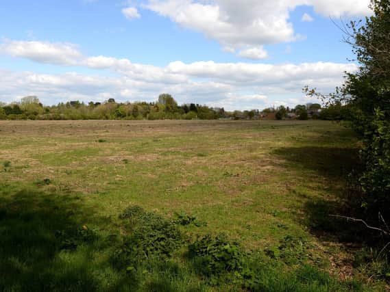 The field in Milton Road, Adderbury which is part of the focus of a split between residents of the village. West Adderbury now wants its own parish council