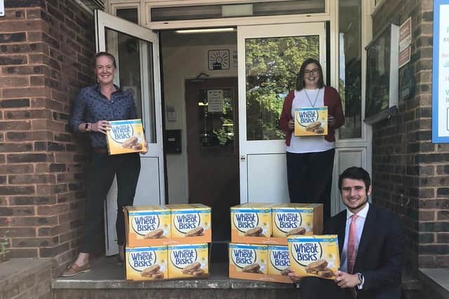 Breakfast items delivered toHill View Primary School by officials with Aldi