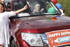Julie Brain enjoys the love of friends and neighbours at her 60th birthday drive-by. Picture by Clarke Penrice