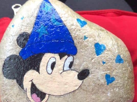 New Mickey Mouse stone painted and placed at the grave for Zena Bough's son in Banbury.