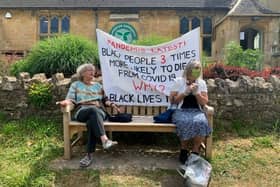 Enjoying a sit-down and ice creams from the shop, 85-year-old Patricia Karlsenand 78-year-old Liz Hodgkin hold their own two-woman protest for the Black Lives Matter movement (photo by DebbieSarjan)
