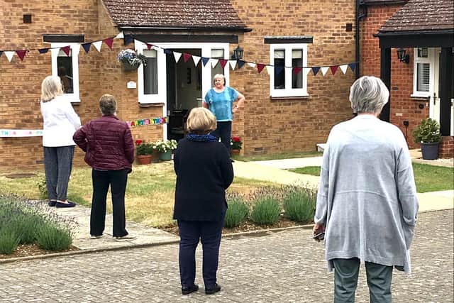 Friends and neighbours surprised long-time nurse, Anne Watts, with a 'Happy Birthday' song on Monday to mark her 80th birthday