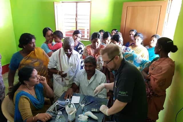 Dr Robbie Kerry, a consultant anaesthetist at the Horton General Hospital, runs a clinic in India during his annual leave