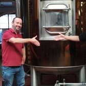 Gun Dog Ales founder James Pickering and Phipps Northampton Brewery Company managing directorAlaric Neville celebrate the two firms merging