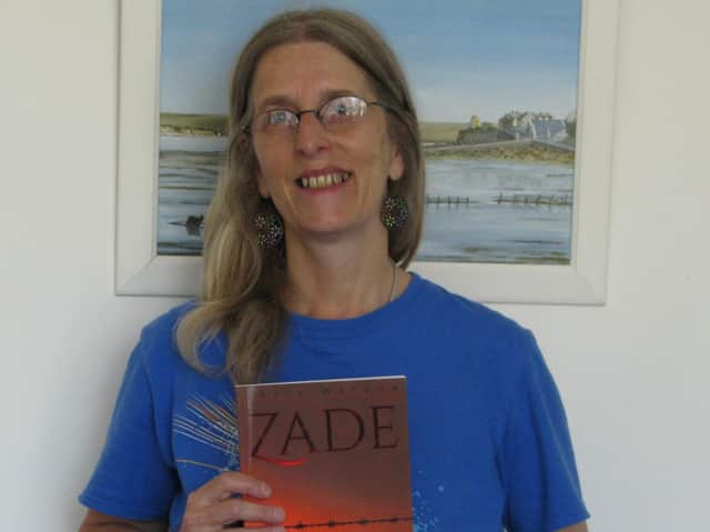 Career eductor from Shipston, Chris Malone, holds her new book 'Zade'