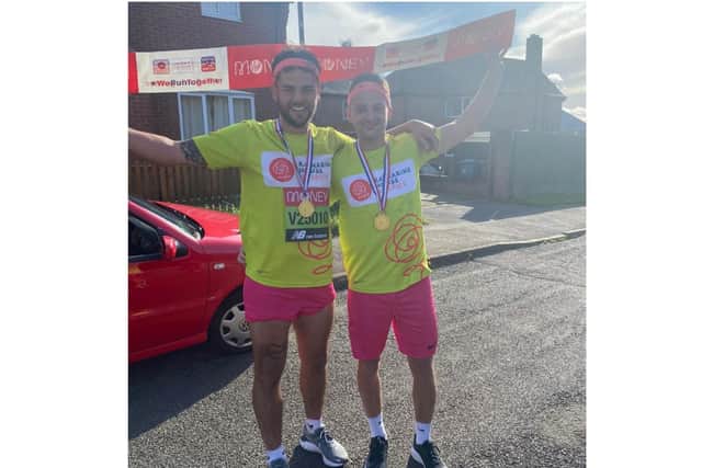 Two Banbury friends - Niall Higgins and Tommy Kinch - have raised nearly £2,000 in a virtual London Marathon running challenge to help the charity Katharine House Hospice.