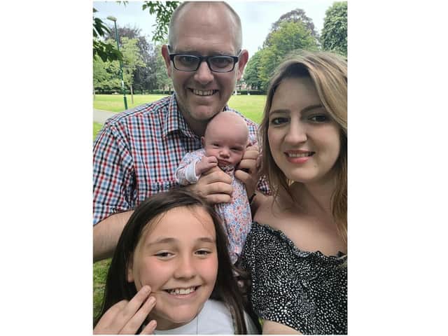 Banbury man, Calvin Findlay, speaks out about his struggles with gambling (pictured: Calvin, his daughters - baby Rosie and Hollie - and his fiancée Laura)