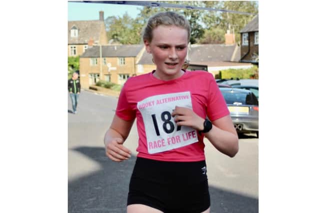 Leila Denne, aged 13, who beat over 190 runners to come first overall at the Hooky Alternative Race for Life event held on Sunday October 3. (Photo by Bethan Dennick)