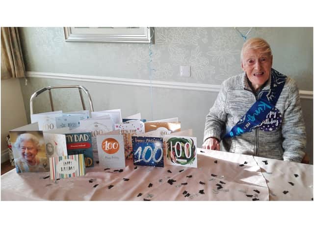 Francis Orchard celebrated his 100th birthday and enjoyed opening his cards, including one from the Queen with his neighbours and a few visiting family members at the Larkrise Care Centre in Banbury. (Submitted photo)