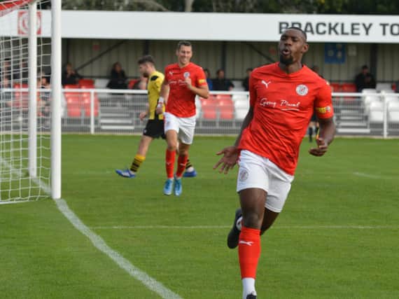 Lee Ndlovu celebrates after he scored in Brackley Town's 1-1 draw with Guiseley. Picture by Brian Martin