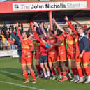 Players celebrate their 1-0 win over Bath City to reach the first round proper of the FA Cup  PICTURES BY JULIE HAWKINS