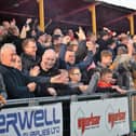 Supporters enjoying Banbury's victory over Bath City in the FA Cup last weekend  PICTURES BY JULIE HAWKINS