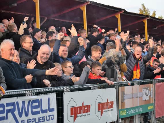 Supporters enjoying Banbury's victory over Bath City in the FA Cup last weekend  PICTURES BY JULIE HAWKINS