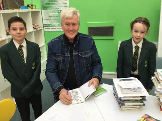 Laurie Stevenson and Mya Netten-Evans, students at Dashwood Academy, Banbury enjoyed a visit from author, Eamonn Reilly (Submitted photo)