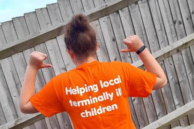 Kayleigh Best will be proudly wearing her Helen and Douglas House teeshirt during her fundraising activities