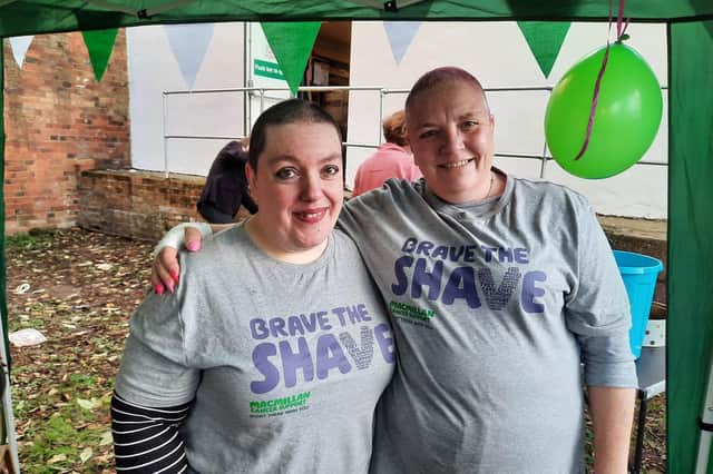 Sarah Humphrey and Pat Davis are pictured after their heads were shaved in a fundraising effort for Macmillan