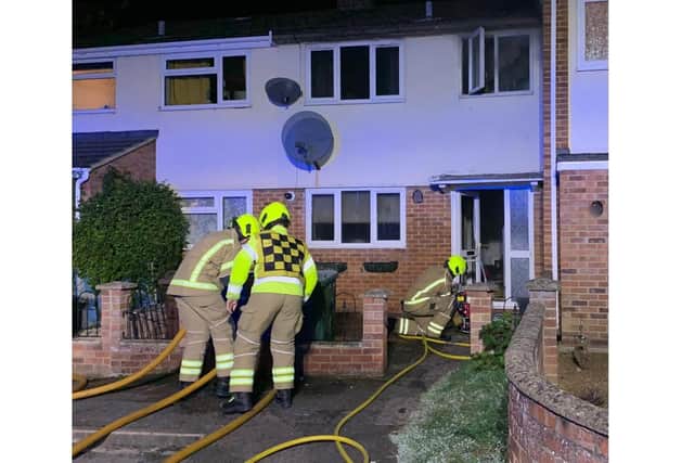 Police have arrested a man on suspicion of attempted arson with intent to endanger life in connection with a house fire in Bicester. (Image from Oxfordshire Fire & Rescue Service Facebook post)