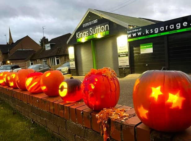 Pumpkins on display outside the King's Sutton Garage, who have launched a pumpkin carving competition in aid of an area charity.