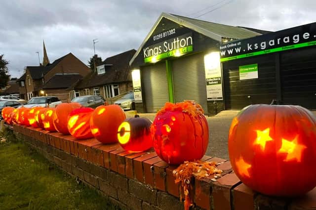 Pumpkins on display outside the King's Sutton Garage, who have launched a pumpkin carving competition in aid of an area charity.