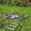 Fire crews from Brackley had to use shovels and a short ladder to free the 85-year-old woman from the mud (photo from Tweet by Neighbourhood, Rural & Wildlife Crime Officer covering South Northamptonshire)