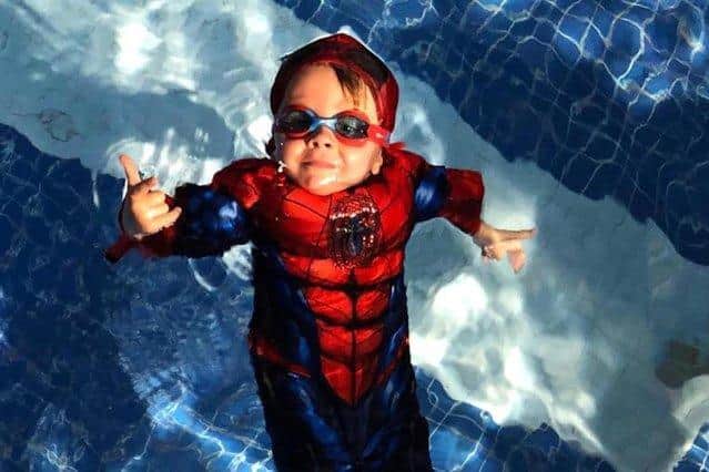 Youngsters dressed as their favourite superheroes for their swimming classes. (Pictured: Arthur Edgington)