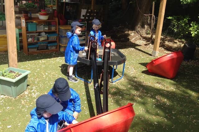 The children of Saltway Nursery in Bodicote explore their new outdoor equipment (Submitted photo)
