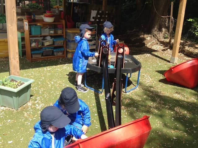 The children of Saltway Nursery in Bodicote explore their new outdoor equipment (Submitted photo)