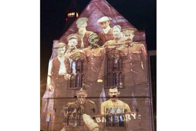 Remembrance 2021 started in Banbury this week with a short but moving armistice film projected on to the side of the town hall. (Image from Banburyshire Info)