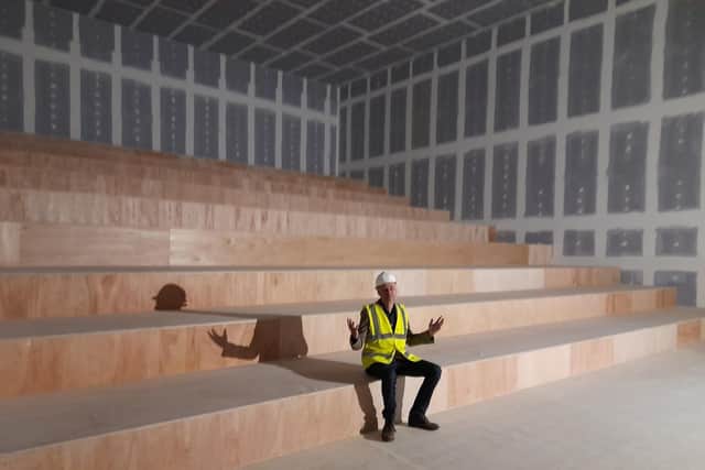 Keith Pullinger, the co-founder and deputy chairman of the Light cinema, sits down inside one of the eight screens at the Light cinema and leisure venue in the Banbury town centre