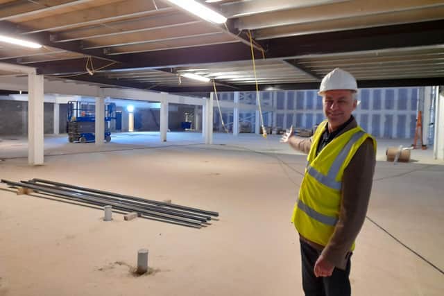 Keith Pullinger, the co-founder and deputy chairman of the Light cinema, points out the area which is being fitted out at the Light cinema and leisure complex in the Banbury town centre