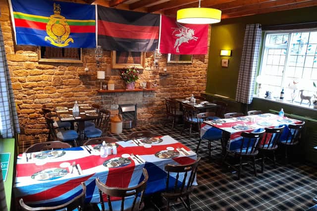 The dining area at The Saye and Sele Arms pub in Broughton near Banbury has been decorated in patriotic colours and flags to mark its tribute Armistice Weekend