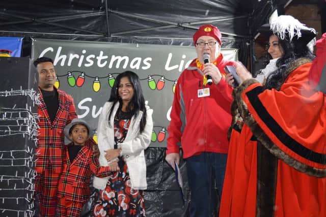 Local community hero Prabhu Natarajan, his six-year-old son Addhu and his wife Shilpa and the Banbury Mayor Shaida Hussain on stage the town's Christmas lights switch-on event on Sunday November 28 (photo from Banbury Town Council)