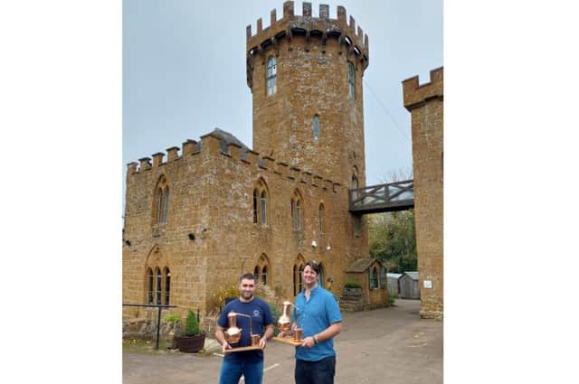 Dan Beckett, who owns Pinnock Distillery, and Mark Higgs, who runs the The Castle pub at Edgehill are set to launch a gin-making school at the pub next year (Submitted photo)
