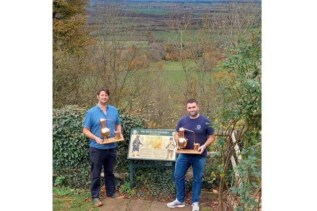 Mark Higgs, who runs the The Castle pub at Edgehill, and Dan Beckett, who owns Pinnock Distillery, are set to launch a gin-making school at the pub next year (Submitted photo)