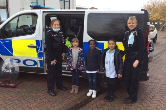 Georgie Donohoe (TVP community police officer) and Dashwood Primary pupils Holly Scott, Damarian Davis and Maham Numan (submitted photo from Dashwood school)
