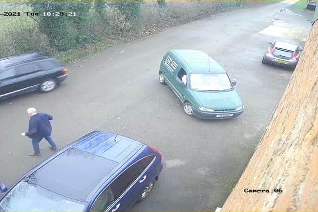 CCTV picture shows the camp site warden's van with smashed windows as the getaway car speeds off. It has an orange LED beacon on the roof. The corner of the smashed red VW Polo is just visible on the left