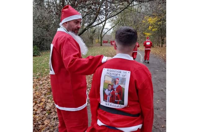 Banbury area school boy Leo ran the 5k in the Santa Fun Run as a tribute to his grandad. Four members of the Brown family took part in the Katharine House Hospice event on Sunday December 5.