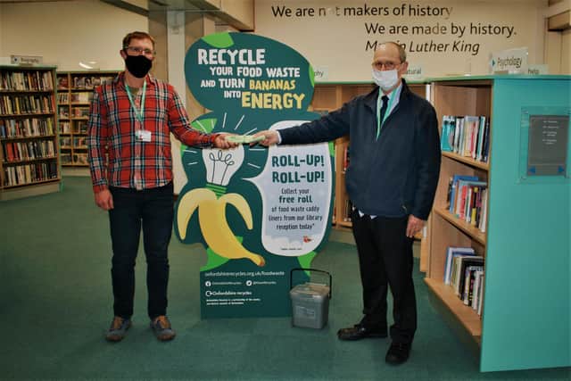 Waste strategy projects officer Mark Watson, left, and library building supervisor John Hagen at one of the participating libraries (photo from Oxfordshire County Council)