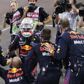 Max Verstappen celebrates with his team after the Abu Dhabi Grand Prix