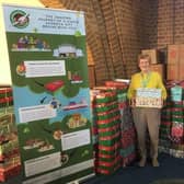 Eunice Harradine is pictured with some of this year's consignment of filled Christmas shoe boxes