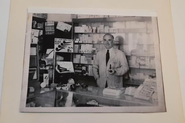 A photo of Jack Cousins inside the family-owned business the Banbury Cross Tobacco Stores. Jack started the business in 1945.