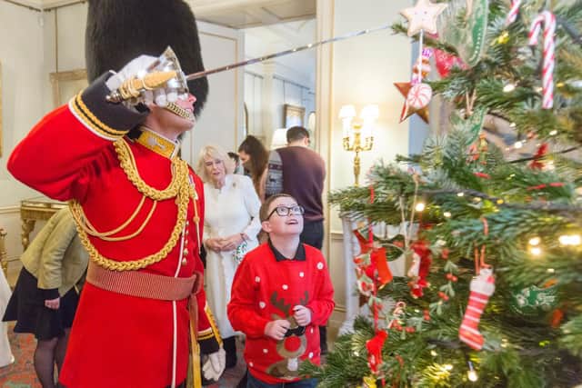 Nathan Best, aged 10 from Banbury, with The Duchess’ Assistant Equerry, Captain Edward Andersen (Submitted photo from the Helen & Douglas House Hospice charity)