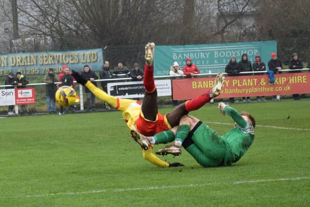 Ben Acquaye is upended to earn Banbury United a penalty