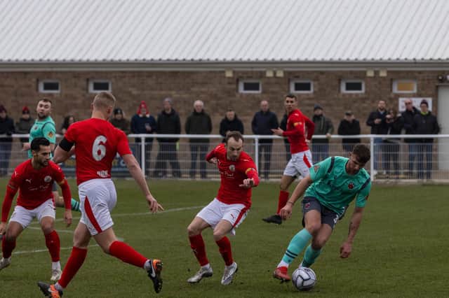 Action from Brackley Town's goalless draw with Chorley last weekend. Picture by Glenn Alcock