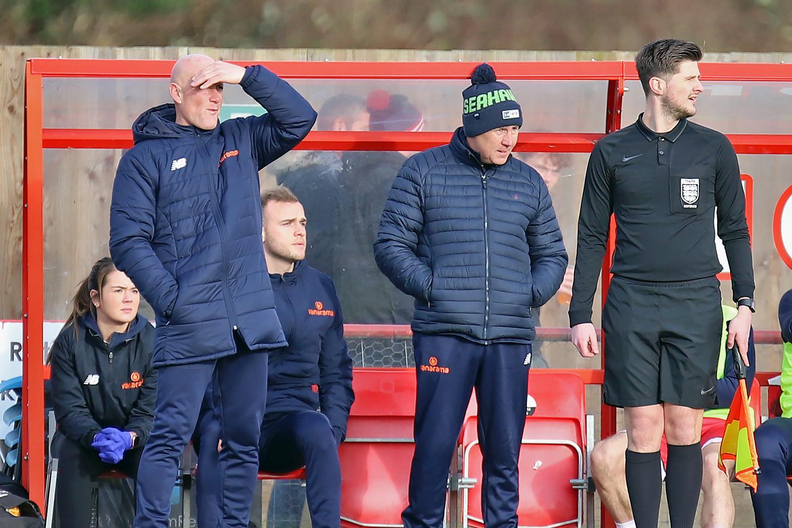 Ian Culverhouse and Paul Bastock watch on from the sidelines