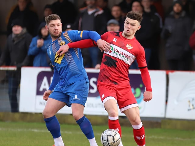 Fresh from signing a contract with the Poppies, Connor Barrett challenges Leamington's Stephan Morley