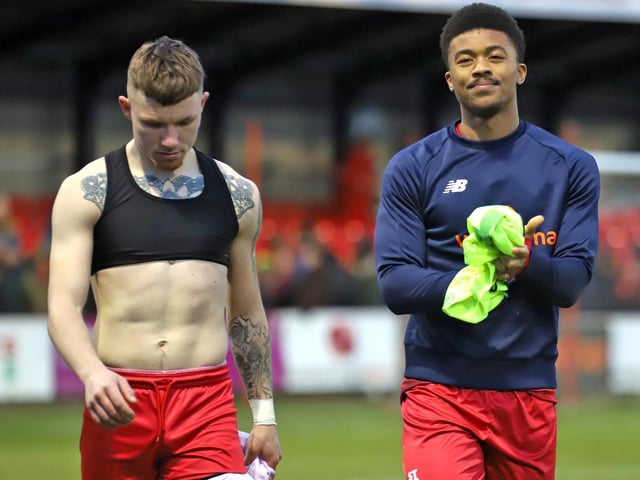 Jordon Crawford and Decarrey Sheriff make their way off the pitch following the 1-1 stalemate